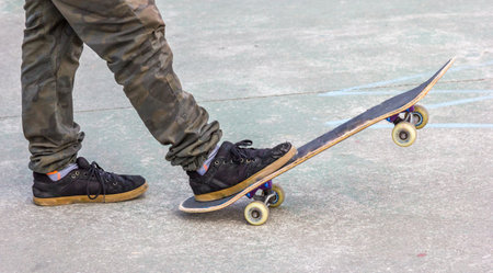 A close-up shot of a skateboarder at the skate park.
