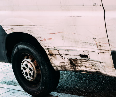 A closeup shot of a scratched car exteriorの写真素材