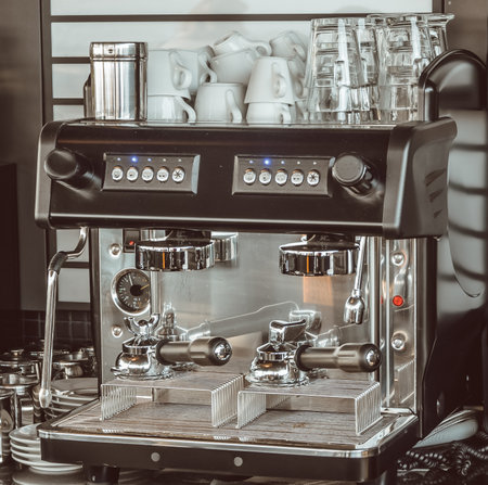 The picture shows a view of a professional coffee machine in a restaurantの写真素材