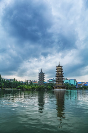 A view of the Sun and Moon Twin Pagodas at Shanhu Lake (Fir Lake). Gold and Silver Pagodasの写真素材