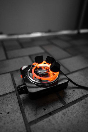 A vertical shot of a coal burnerの写真素材