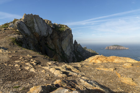 The Penas Cape cliffs by the sea at sunrise in Asturias, north of Spainの写真素材
