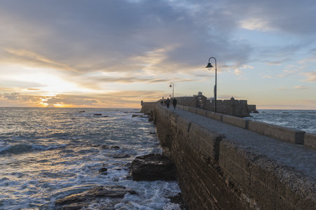 A beautiful sunset on Cadiz coastal bridge in Province of Andalucia, Spainの写真素材