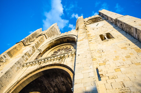 A low angle shot of the Lisbon Cathedral in Portugalの写真素材