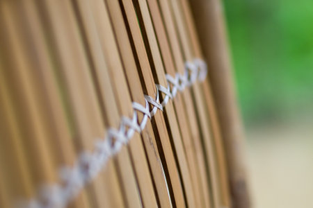 Close up shot of a bamboo wall in Saigon Vietnam. It was a rainy day.