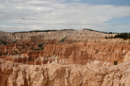 An aerial view of a landscape of a canyon under a bright skの写真素材