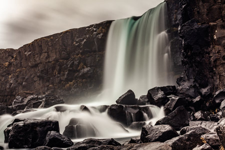 A waterfall in Thingvellir National Parkの写真素材