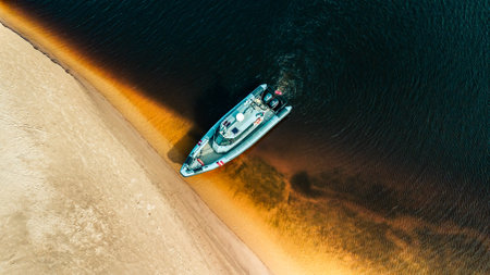 An aerial view of Latvia State Border Guard military boat patrollingの写真素材