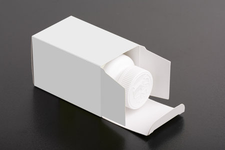 A pillbox dietary supplement package with a bottle inside; editable mock-up series ready for design,...