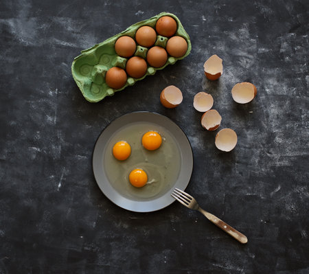 The ingredients to cook a healthy no carbs breakfast with eggsの写真素材