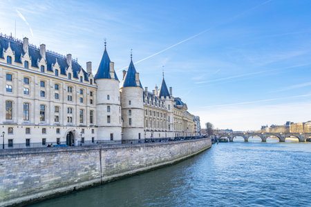 The Supreme Court of Paris overlooking the Seine River on a sunny day and blue skyの写真素材