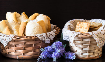 A closeup shot of traditional Brazilian bread in a basketの写真素材
