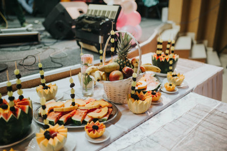 A closeup shot of freshly cut watermelon on trays on the table