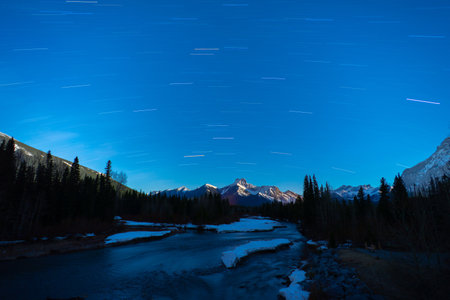 A mesmerizing view of the star streaks seen over Kananaskis, Alberta, Canadaの写真素材