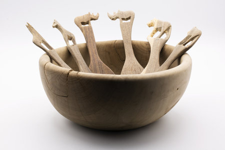 A wooden utensil for the kitchen isolated on white backgroundの写真素材