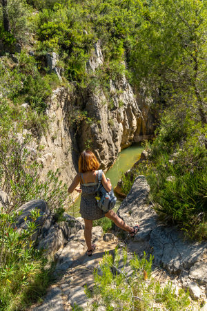 Route of the Pantaneros towards the hanging bridges in the Loriguilla reservoir. Chulilla town in the Valencian community. Spainの写真素材