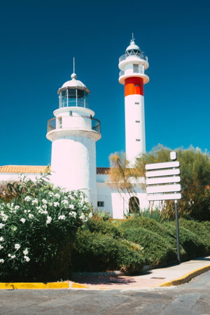 The Lighthouses next to the mill. Sunny day in El Rompido, Huelva, Andalusia, Spainの写真素材