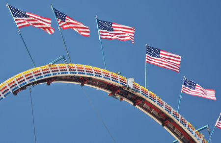 County Fair Carnival Rides with American Flags County Fairの写真素材