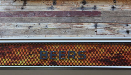 Beer sign on rustic building, Local Restaurant Signの写真素材