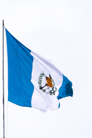 Flag of Guatemala, declared a national symbol on August 17, 1871, coat of arms waving in the wind.の写真素材