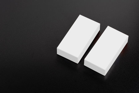 White boxes package on table, editable mock-up series ready for your design, selection path included.の写真素材