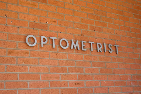Optometrist Sign Optometrist Sign on Brick Wallの写真素材