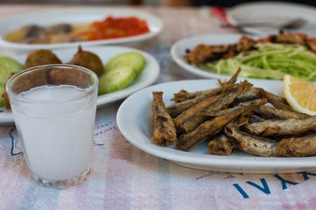 Ouzeri fish tavern , tsipouro restaurant in Volos, Greece. Taverns, bulk tsipouro good appetizers, Seafood . fish , go to Volos for tsipouro.の写真素材