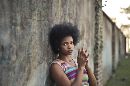 portrait of a young black woman in a parkの写真素材
