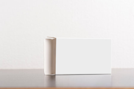 Opened empty pillbox on dark background,  editable mock-up series template ready for your design, faces selection path included.の写真素材