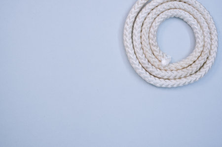 A closeup shot of a rope on a blue surface - copy spaceの写真素材