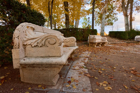 Stone bank in the garden of the Parterre in autumn. Aranjuez, Madrid, Spainの写真素材