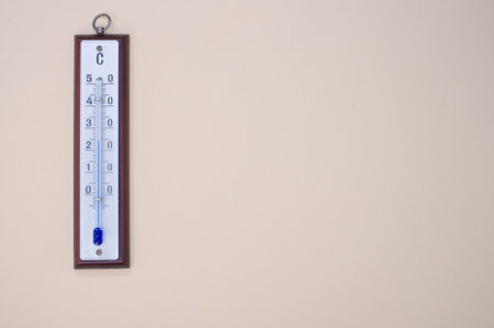 A top view of a thermometer on cream surface with a copy spaceの写真素材