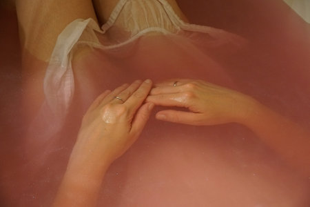 A closeup shot of a woman in a bath