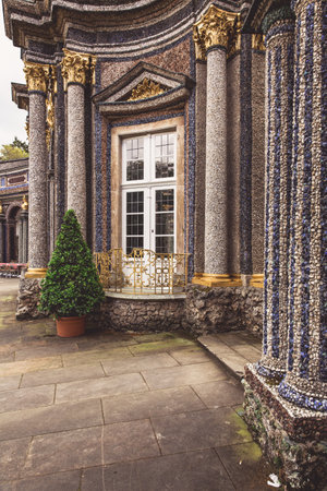 A vertical shot of a patterned building with columns and ornaments in Bayreuth - Eremitenhof, St....
