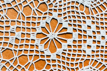 A closeup shot of a white handmade laceの写真素材