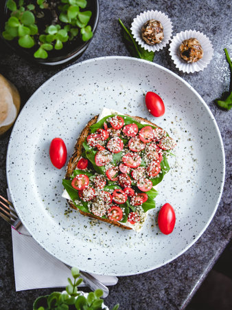 A top view of a healthy sandwich on a plate on the table