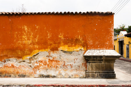 Colonial architecture, Hispanic heritage in the city of La Antigua Guatemala, detail of facades and exterior painting in houses and private propertyの写真素材