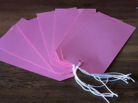 Pink label tags on a desk close up shの写真素材