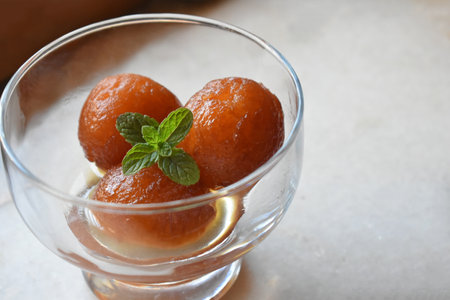 A sweet Gulab Jamun Indian food for festivals or special occasions made up of milk and sugarの写真素材