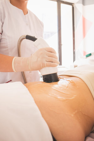 Young Woman enjoying a day at the Spa, to take care of her body. Carrying out different procedures...