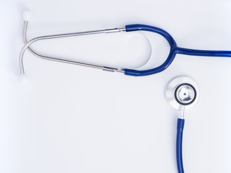 A top view of a medical stethoscope isolated on a white background with copy spaceの写真素材