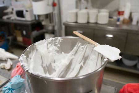A closeup shot of a bowl with cake creamの写真素材