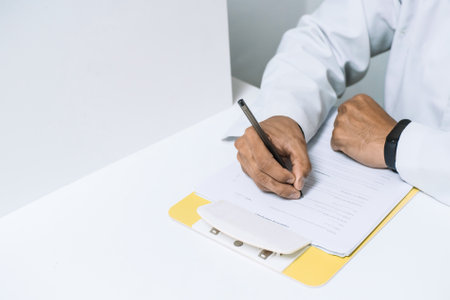 A doctor writing a prescription