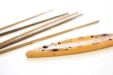 An incense sticks and incense holder isolated on a white backgroundの写真素材
