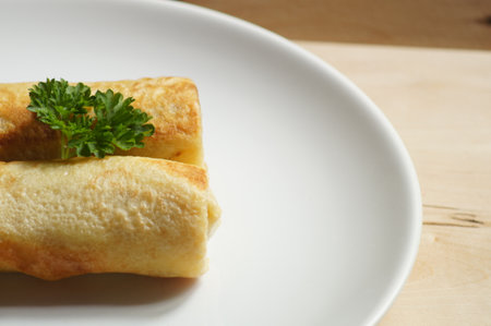 Two croquettes on white plateの写真素材