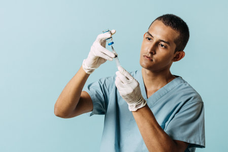 A Latin American nurse holding a injection and a bottle. Education concept.