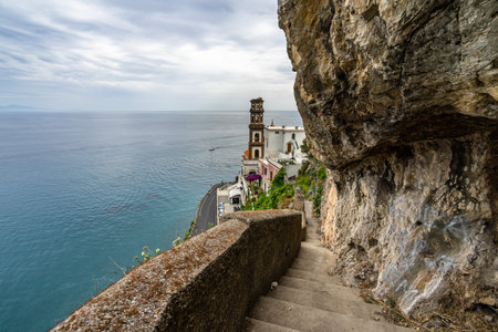 Scenic stairway leading to Atrani overlooking the Mediterranean Sea on the Amalfi Coast, Italyの写真素材