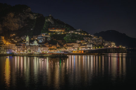 Wide panoramic view of Amalfi at night, Campania region, Italyの写真素材