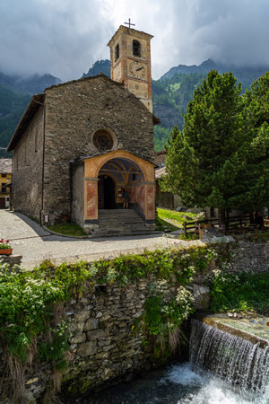 Ancient church of Sant'Antonio built in 14th century, Chianale, Varaita Valley, Piedmont, Italyの写真素材