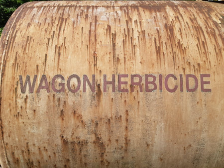 Close-up of old and rusty herbicide wagon barrel outdoorsの写真素材